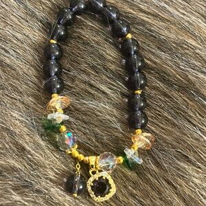 Elegant Black, Gold and Amethyst Beaded Bracelet